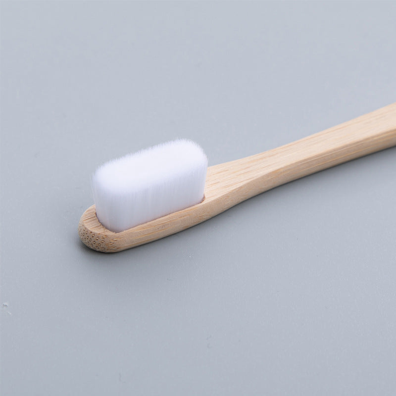 Cepillo de dientes hecho con bambúEco-friendly.
Eco-friendly