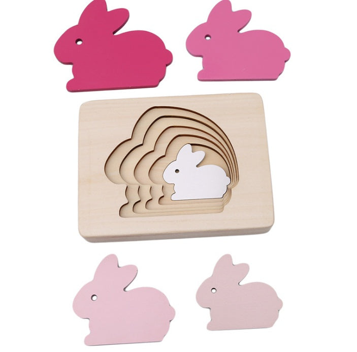 Juguetes educativos Montessori para niños de 1 a 3 años: rompecabezas tridimensional de madera con diseño de animales y colores degradados.