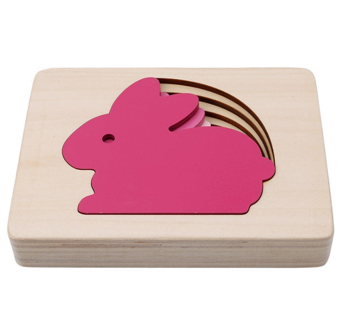 Juguetes educativos Montessori para niños de 1 a 3 años: rompecabezas tridimensional de madera con diseño de animales y colores degradados.