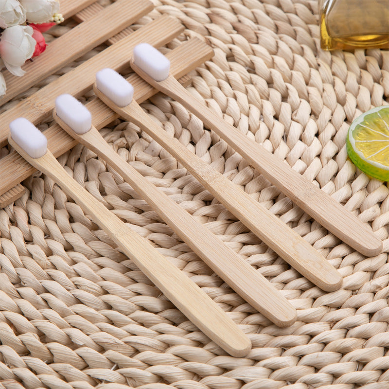Cepillo de dientes hecho con bambúEco-friendly.
Eco-friendly