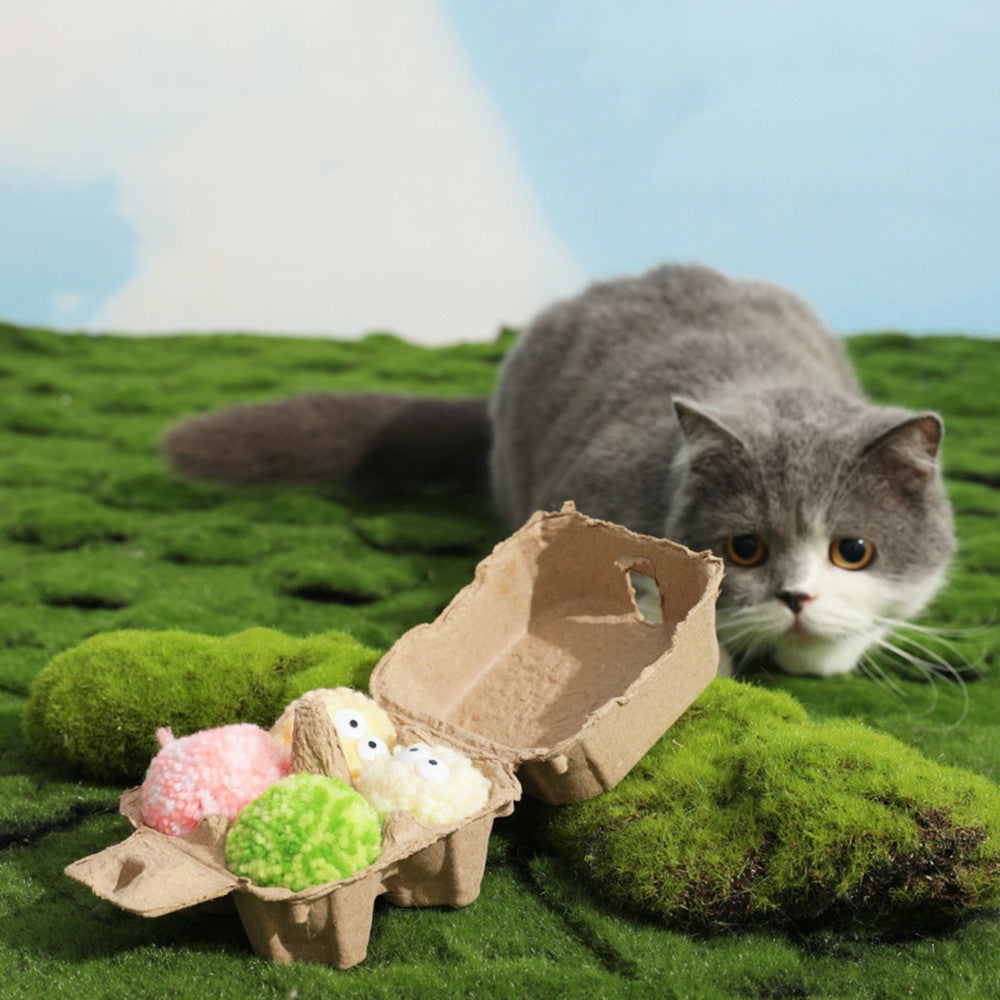Juguete para perros en envase de cartón ecológico con campanilla incorporada.
