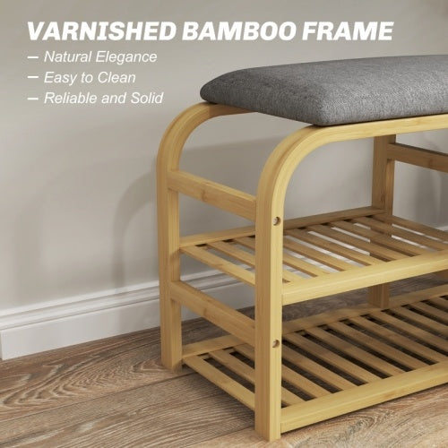 Banco-zapatero de bambú con asiento acolchado y acabado en madera natural.