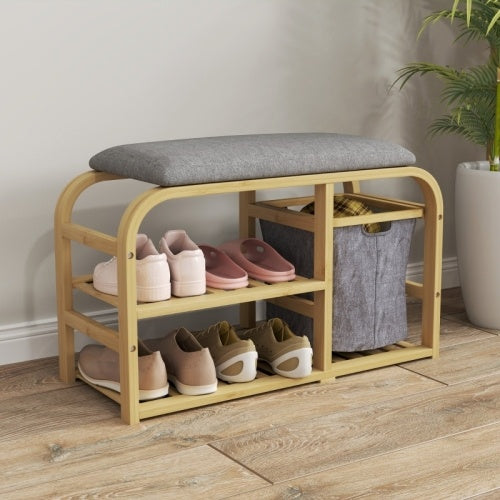 Banco-zapatero de bambú con asiento acolchado y acabado en madera natural.